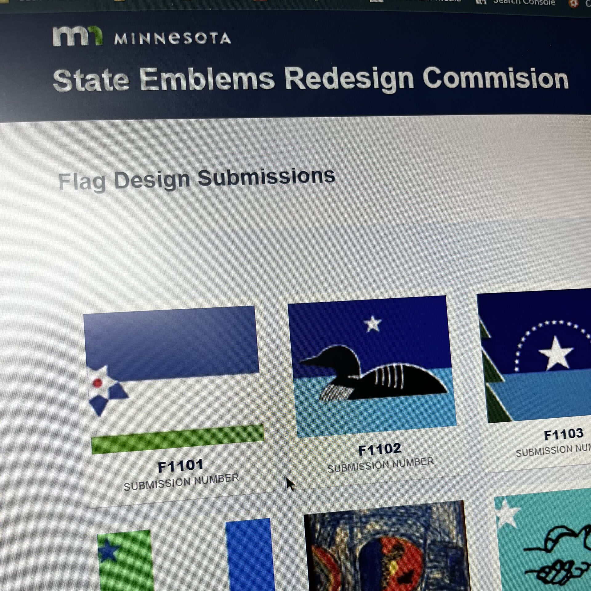 Photo of flags on a screen.